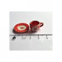 miniatyyrit punainen jouluinen kahvikuppi ja lautanen 